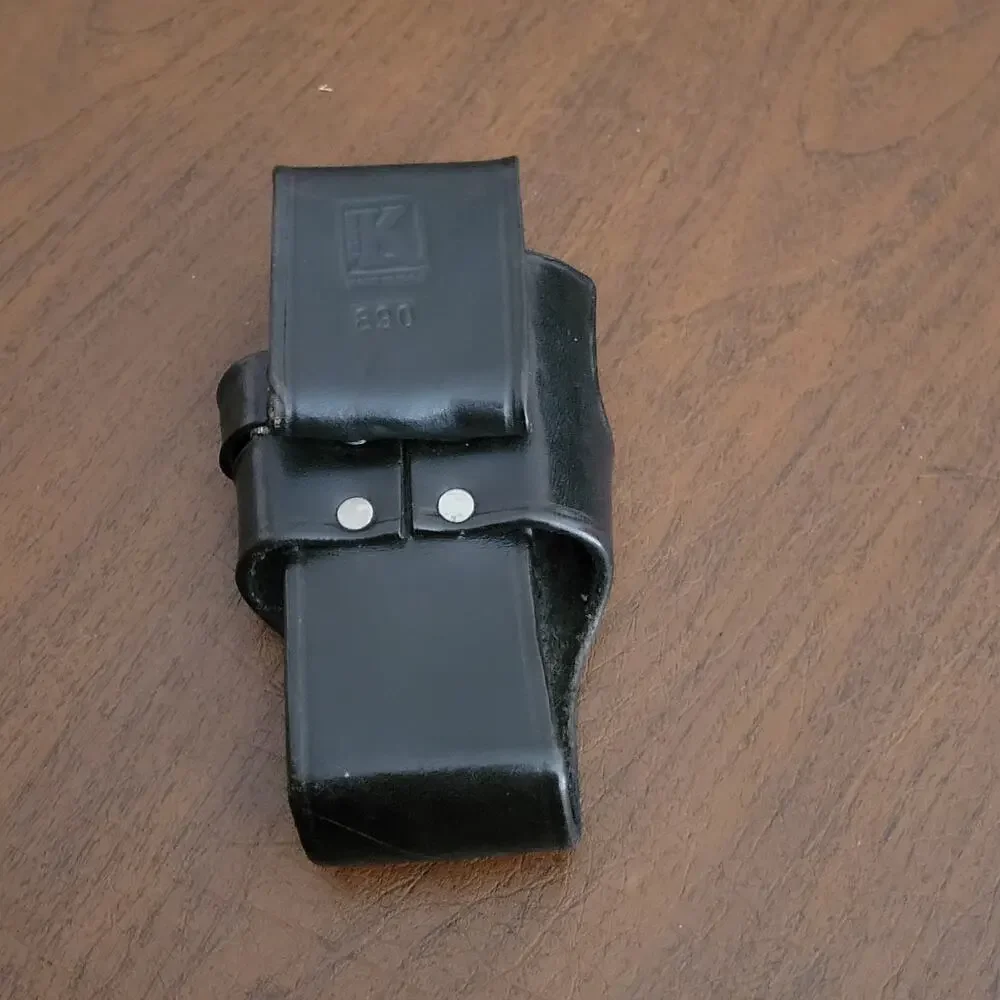 Triple K 890 Black Leather Radio Holster. Pre-owned, good shape.